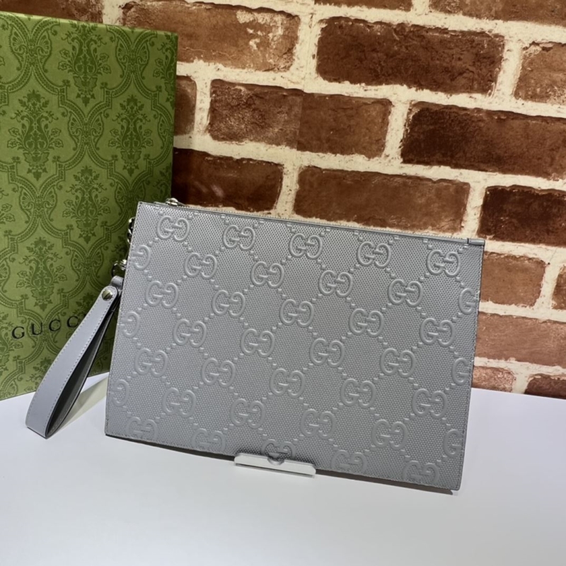G*u*i clutch bags